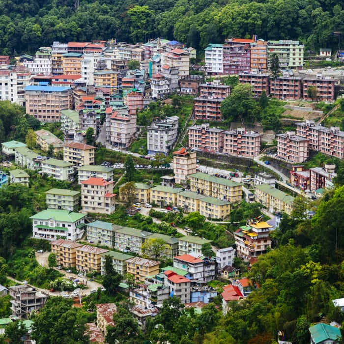 The spread of Gangtok across its hillside in Sikkim, seen from a walkway