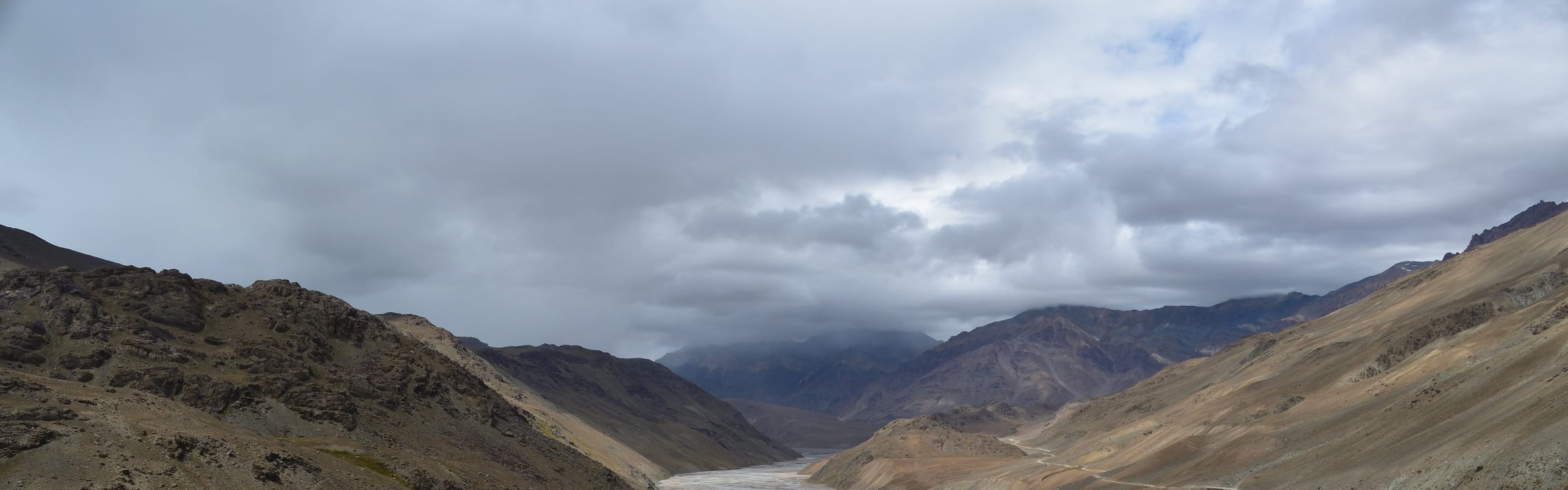 The Chandra river bed at Batal on the Manali–Leh road, with snowfields above it in Lahaul and Spiti